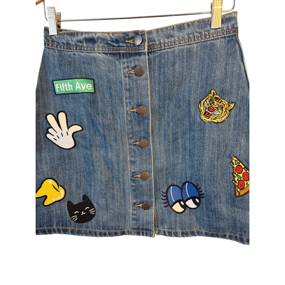 VINTAGE STYLE 6ixty8ight denim mini skirt featuring embroidered patches.